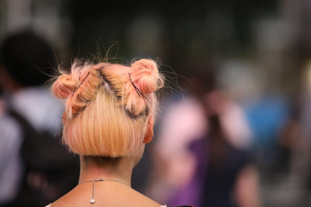 When I need to zone out for a bit and relax, I usually walk down to Shibuya Crossing in Tokyo, camera in hand, and watch people passing by. One day this woman caught my eye, with all the pink, random strands of hair, and I managed to grab this shot before she disappeared into the endless and massive flow of people crossing the street. It’s an absolute favorite of mine.